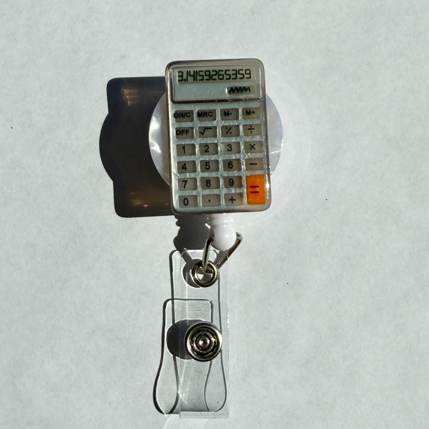 Calculator Badge Reel