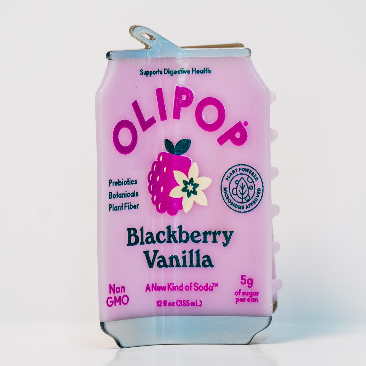 A hair claw designed to look like a Blackberry Vanilla OLIPOP can! The can is pink with a blackberry and white flower detail, as well as the OLIPOP branding and drink information